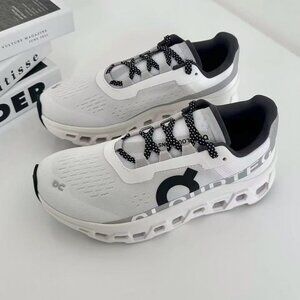 On Running White and Black Sneakers